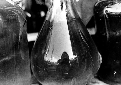 Bottles, 1975 - by David J. L'Hoste