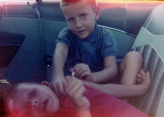 Randy and David wrestling in  '59 Chevy Impala